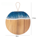 planche à découper en bois ronde motif vague